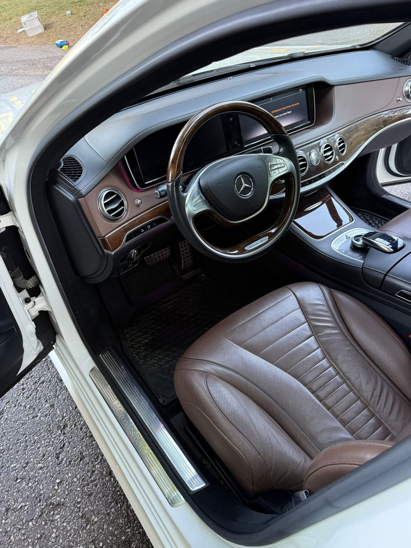Exterior detail, cleaned leather seats and door sill